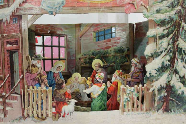 Eine Weihnachtskrippe mit der Heiligen Familie, Hirten und Weisen. 
Test